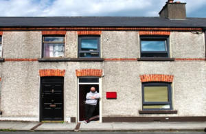 Man standing at front door