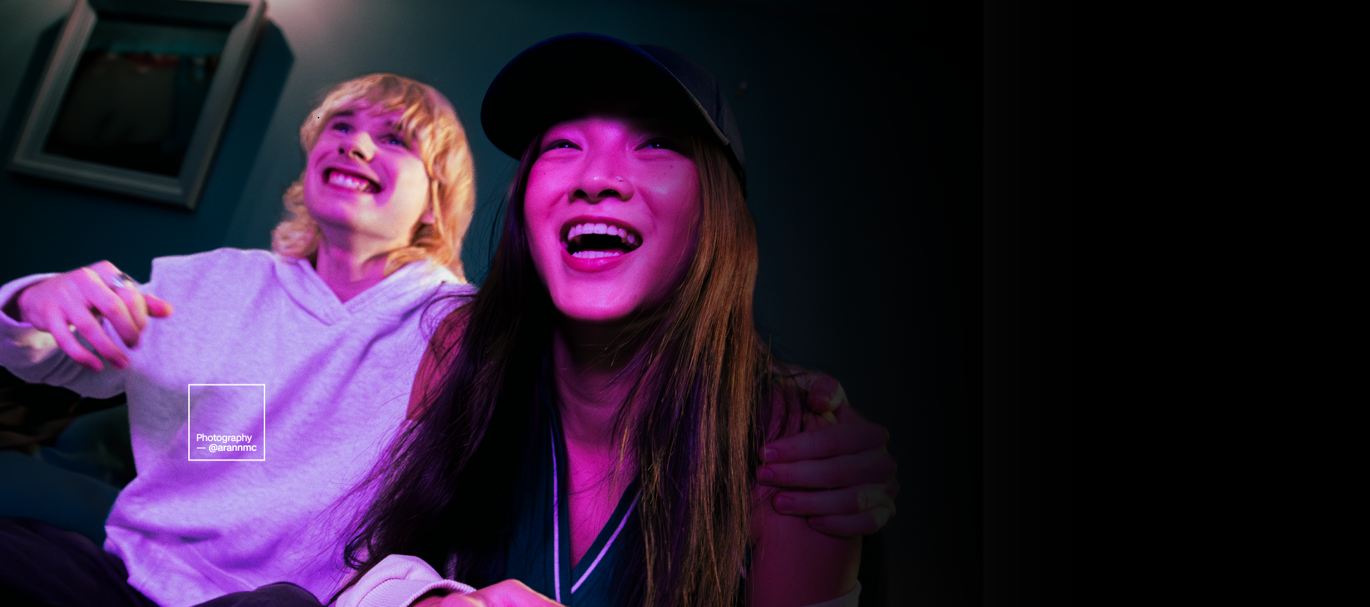 Two friends laughing together
